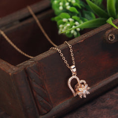 Stainless Steel Gold/Rosegold Plated Heart Shaped Spinning Pendent Necklace- SSNK 4326